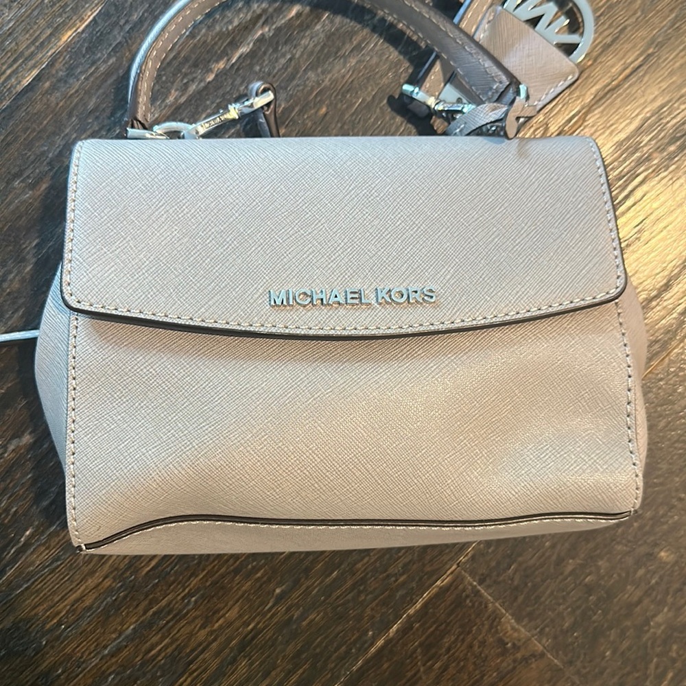 Michael Kors mini bag could be a clutch or a cross body